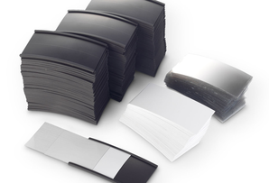 Magnetic C profile label holders with insert cards for changeable warehouse shelf labels.
