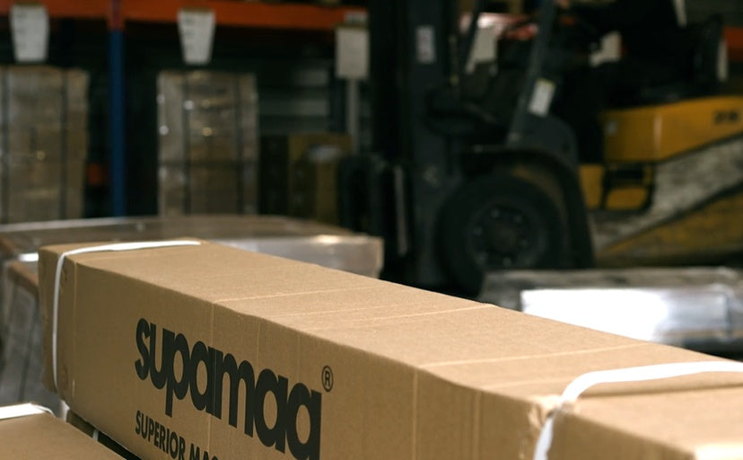Boxes of magnetic sheet material prepared for bulk supply in a warehouse
